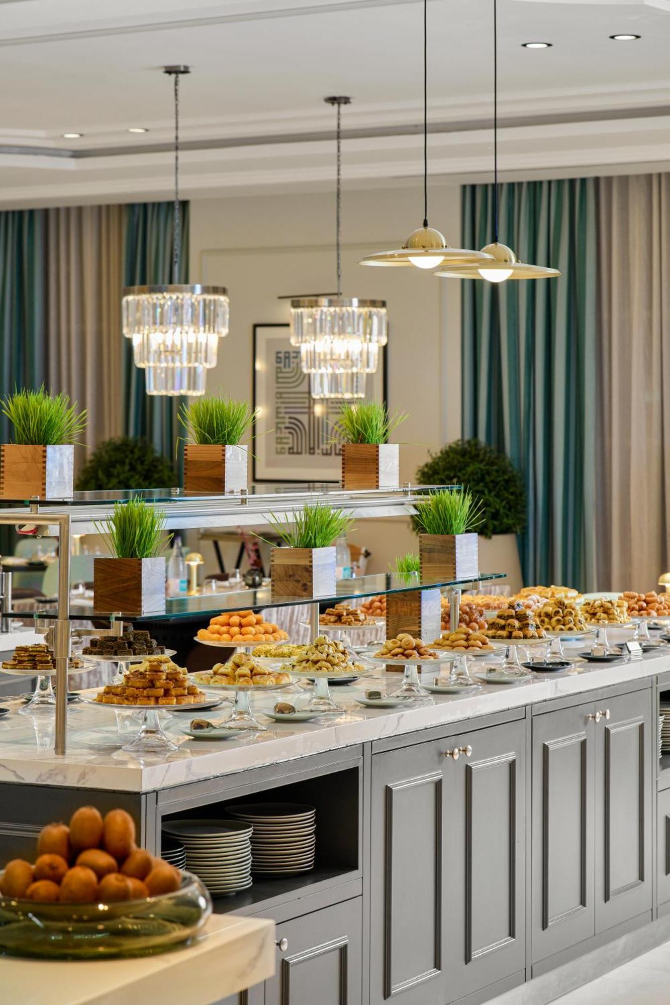 Address Jabal Omar Makkah Aparthotel Mecca Exterior photo A buffet at a hotel
